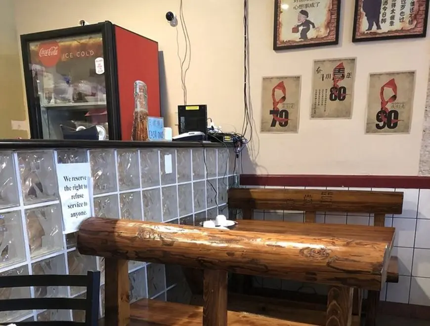 Interior dining area with tables and warm ambient lighting