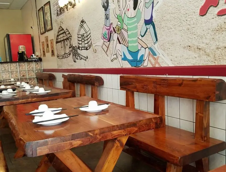 Restaurant interior showing traditional Chinese decor and dining space